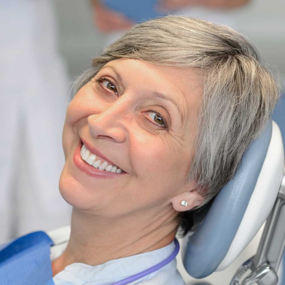 Relieved woman after successful Tooth Extraction